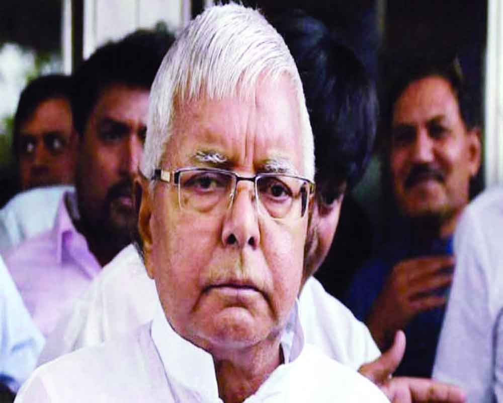 Lalu Caught in the Same Chains he Laid