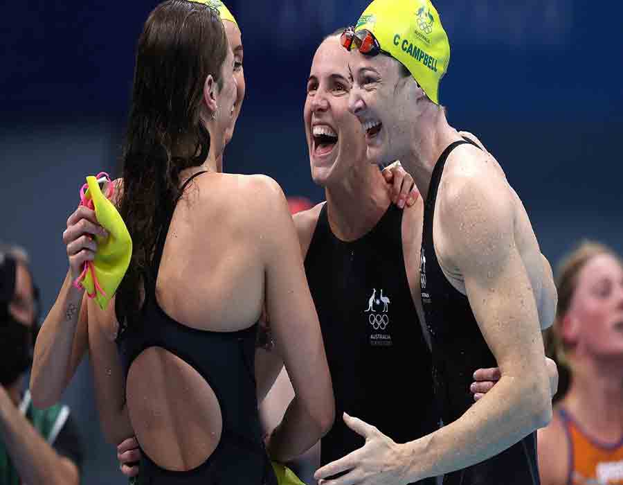 Olympic swim stars enter quarantine on return to Australia