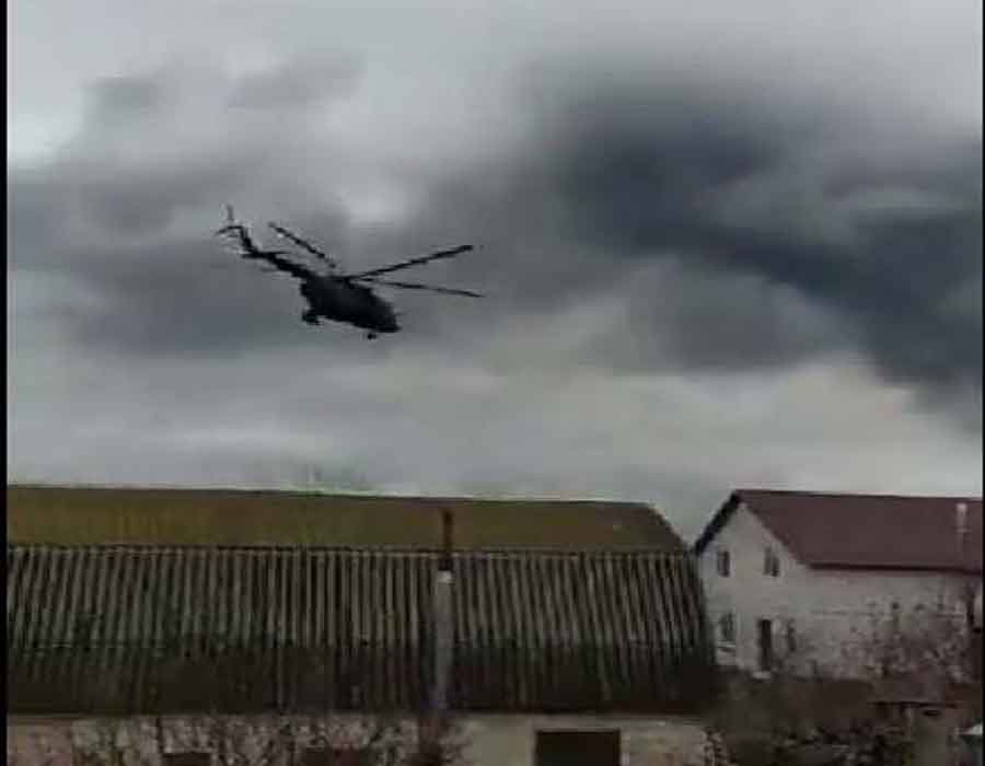 Russian helicopters swarm over Ukraine's capital